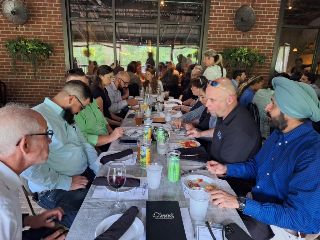 People eating at a table at dinner
