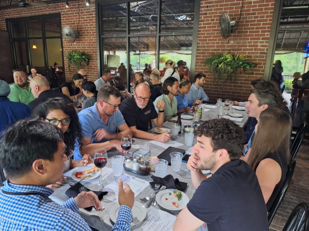 People eating at a table at dinner